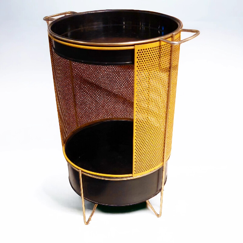 F 355 JC DescriptionBlack and yellow perforated dry bar or side table in the style of Mathieu Matégot