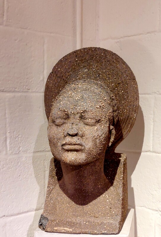 M 145 JC Head of Mangtebu woman, lava stone by Emile Adolphe Monier France 1930s