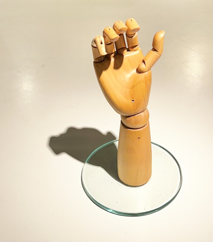 M 281 JC articulated wood hand with glass base 