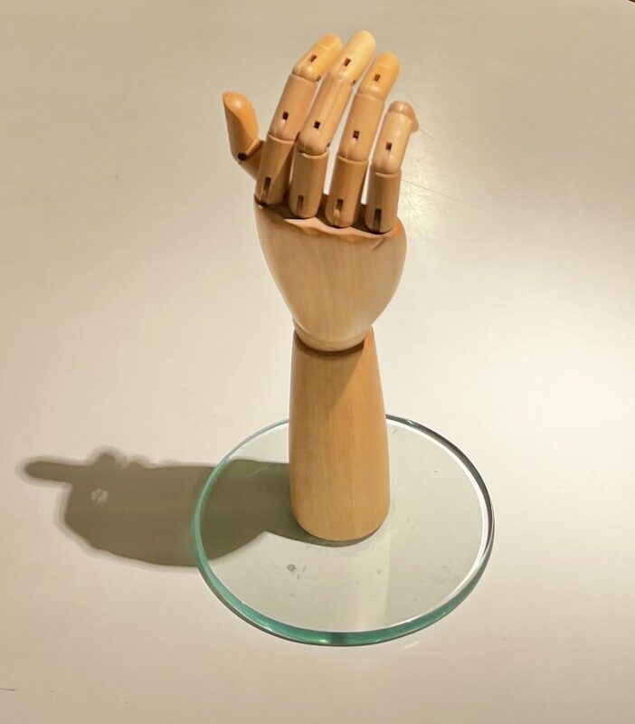 M 281 JC articulated wood hand with glass base 